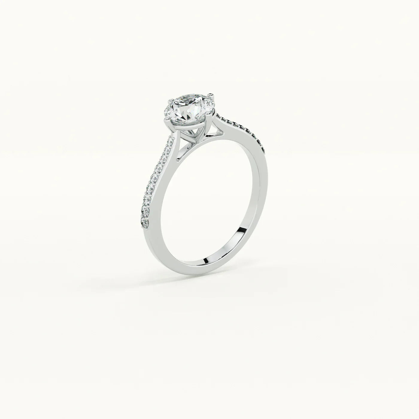 Silver ring with a diamond on a white background